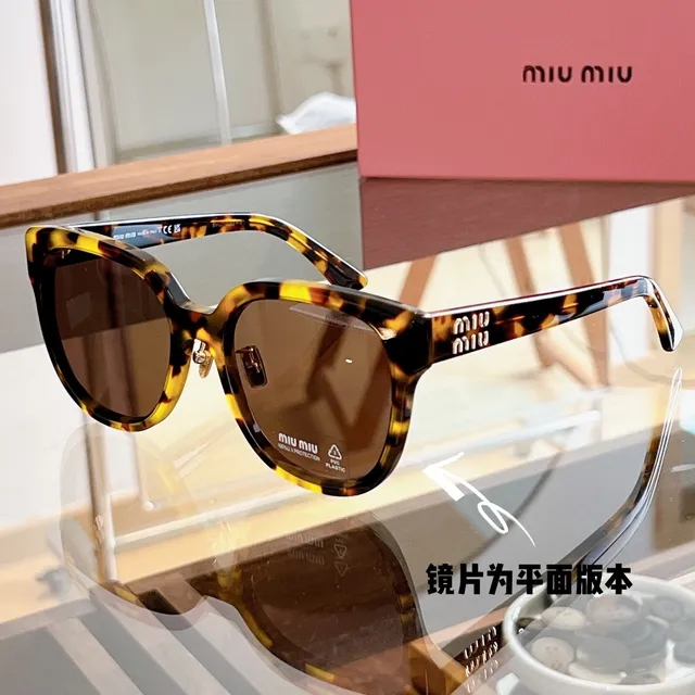 Miu Miu Wander Lunettes de soleil cat-eye écaille de tortue 8