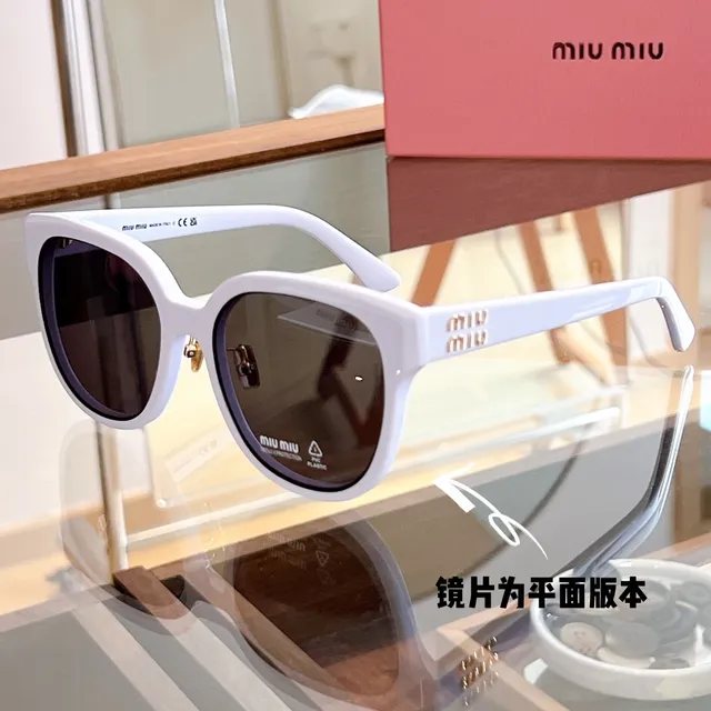 Miu Miu Wander Lunettes de soleil cat-eye écaille de tortue 9