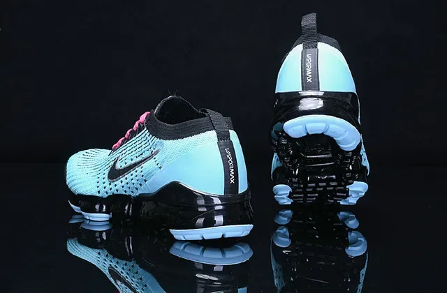 Nike Sneakers Lifestyle Bleues et Roses Flyknit Upper Air Cushioning Visible 8