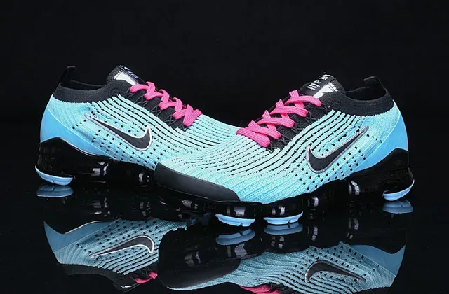 Nike Sneakers Lifestyle Bleues et Roses Flyknit Upper Air Cushioning Visible 10