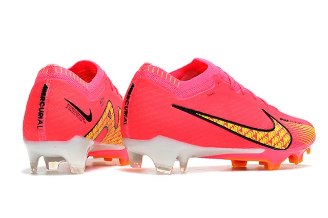 Nike Tênis de futebol com upper de malha rosa amarelo neón sobreposição Swoosh geométrica superfície firme 7