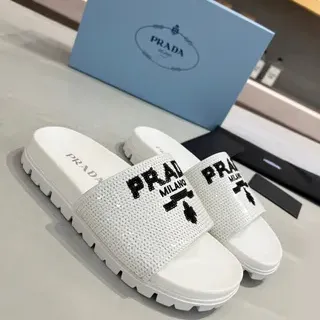 Prada Cloudbust Slide نعال أبيض شبكية مطرزة بشعار
