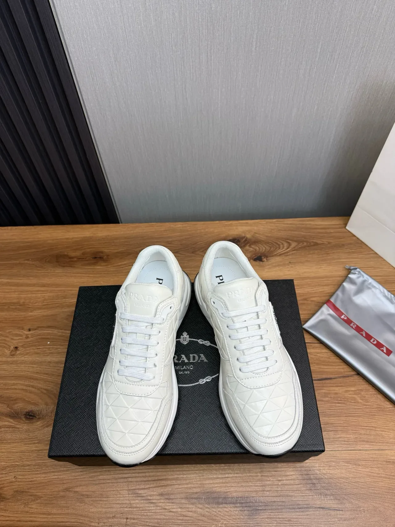 Prada White Black Quilted Leather Upper Triangular Logo Plaque Lifestyle Sneakers 2