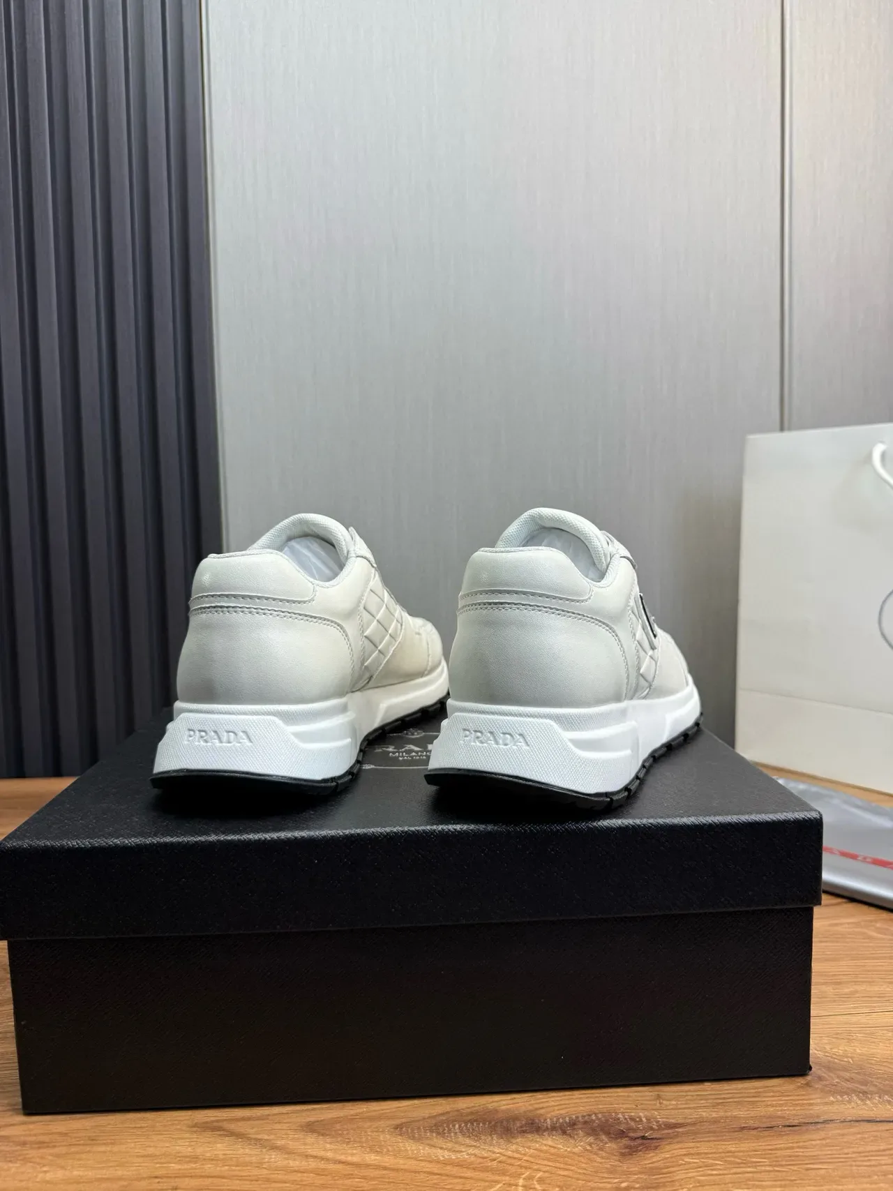 Prada White Black Quilted Leather Upper Triangular Logo Plaque Lifestyle Sneakers 4