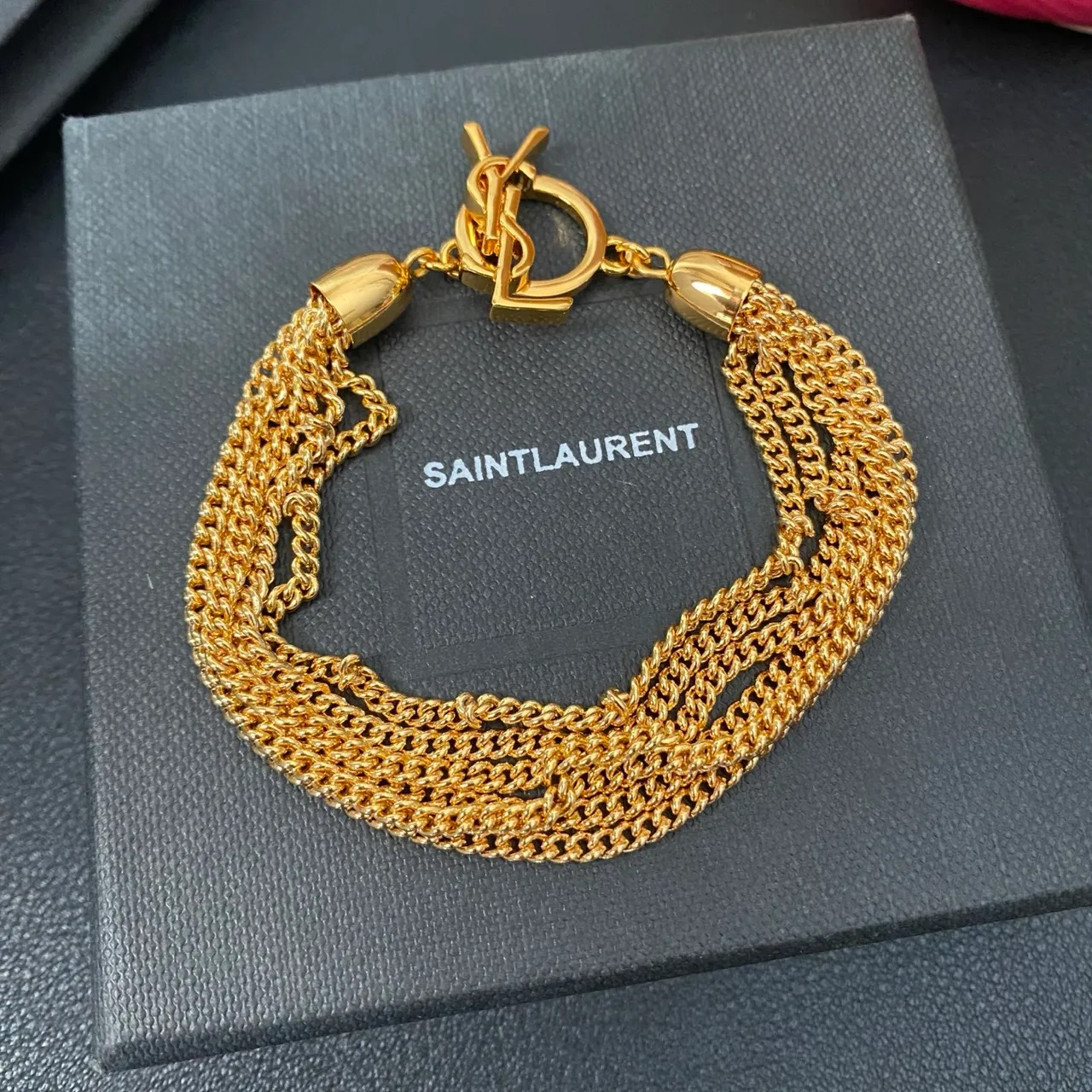 Saint Laurent Bracelet chaîne Curb multi-fils métal poli doré 7