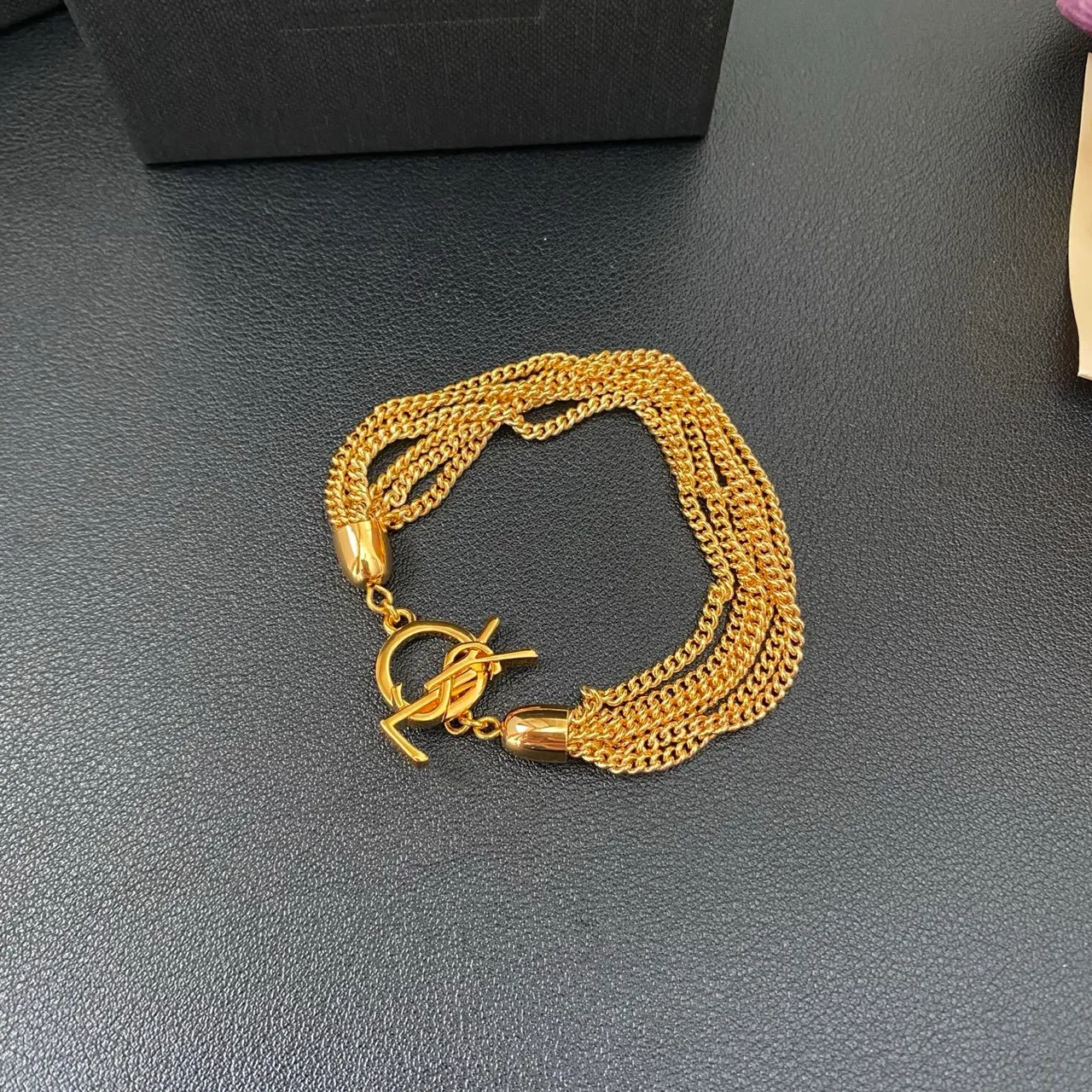 Saint Laurent Bracelet chaîne Curb multi-fils métal poli doré 10