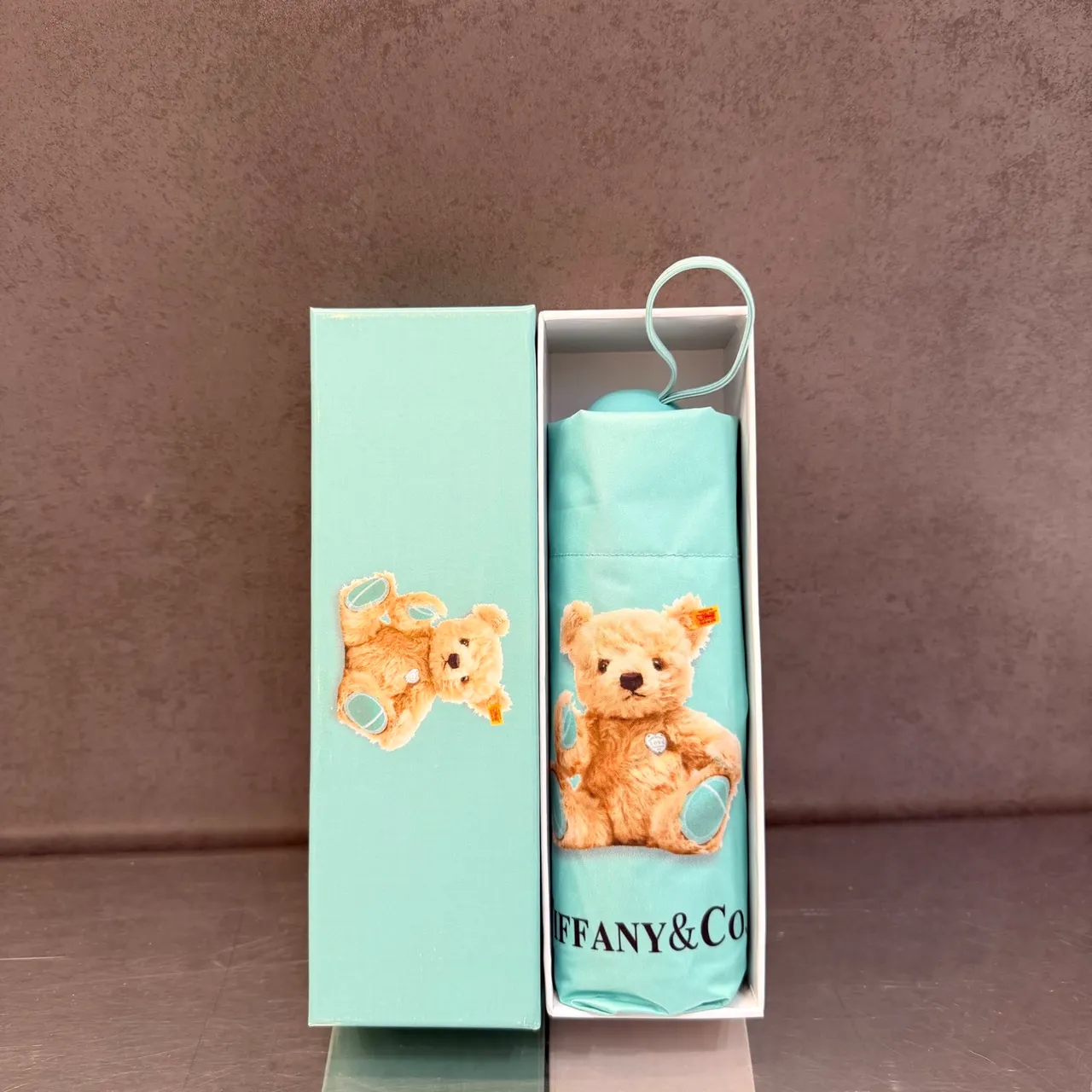 Tiffany & Co. sac à main au motif d'ours en peluche imprimé bleu marron avec auvent 8