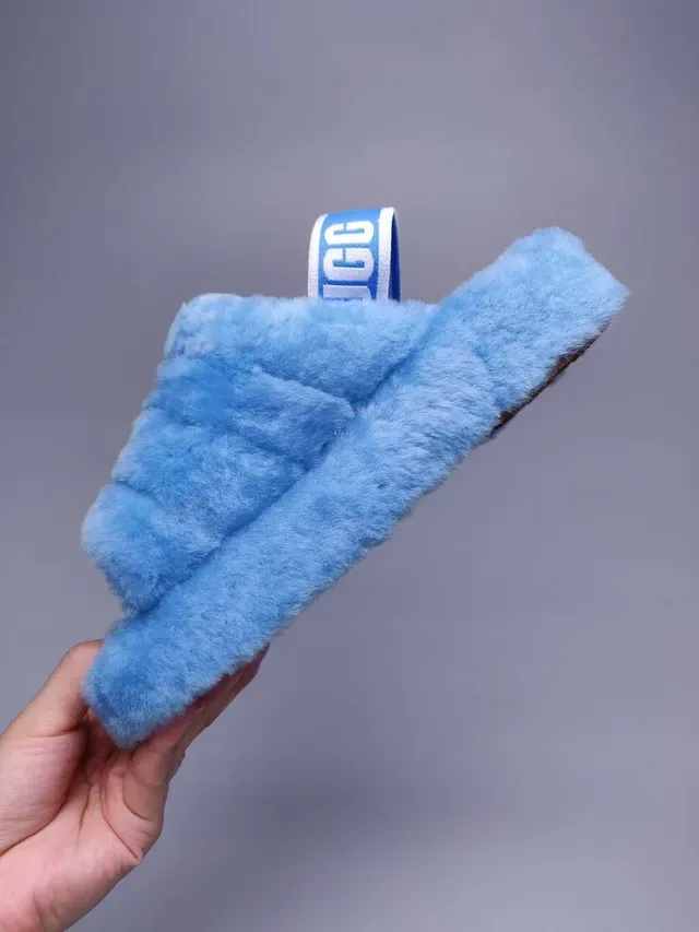 UGG Tasman أزرق فاتح فرو ناعم صندل منزلي 7