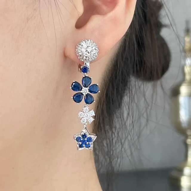 Van Cleef & Arpels Boucles d'oreilles asymétriques florales et étoilées pendantes 9