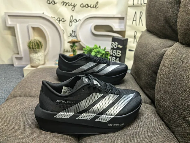 Adidas Adizero Evo SL 2 Off-White and Red Chaussures de course 11