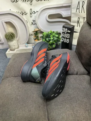 Adidas Black and Red Three-Stripe Lifestyle Sneakers 6