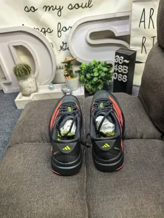 Adidas Black and Red Three-Stripe Lifestyle Sneakers 8