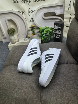 Adidas Black and White Three-Stripe Lifestyle Sneakers 6