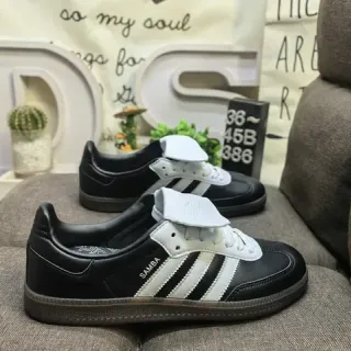 Adidas काली सफेद लेसहीन लो टॉप चमड़े के ऊपरी जीवन शैली स्नीकर