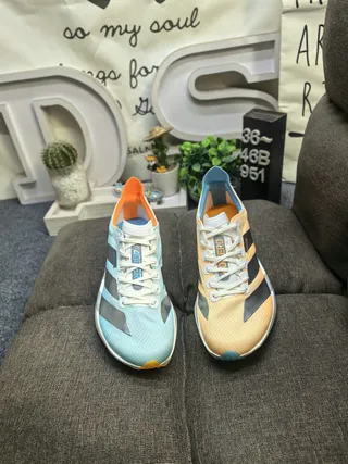 Adidas Chaussures Running Bleu Orange tige mesh ingénierie overlay de trois rayures métalliques 10