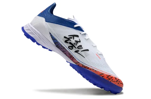 Adidas Chaussures de Football Turf Synthétiques Blanches et Bleues avec Système de Lacets Asymétriques Profil Bas 2