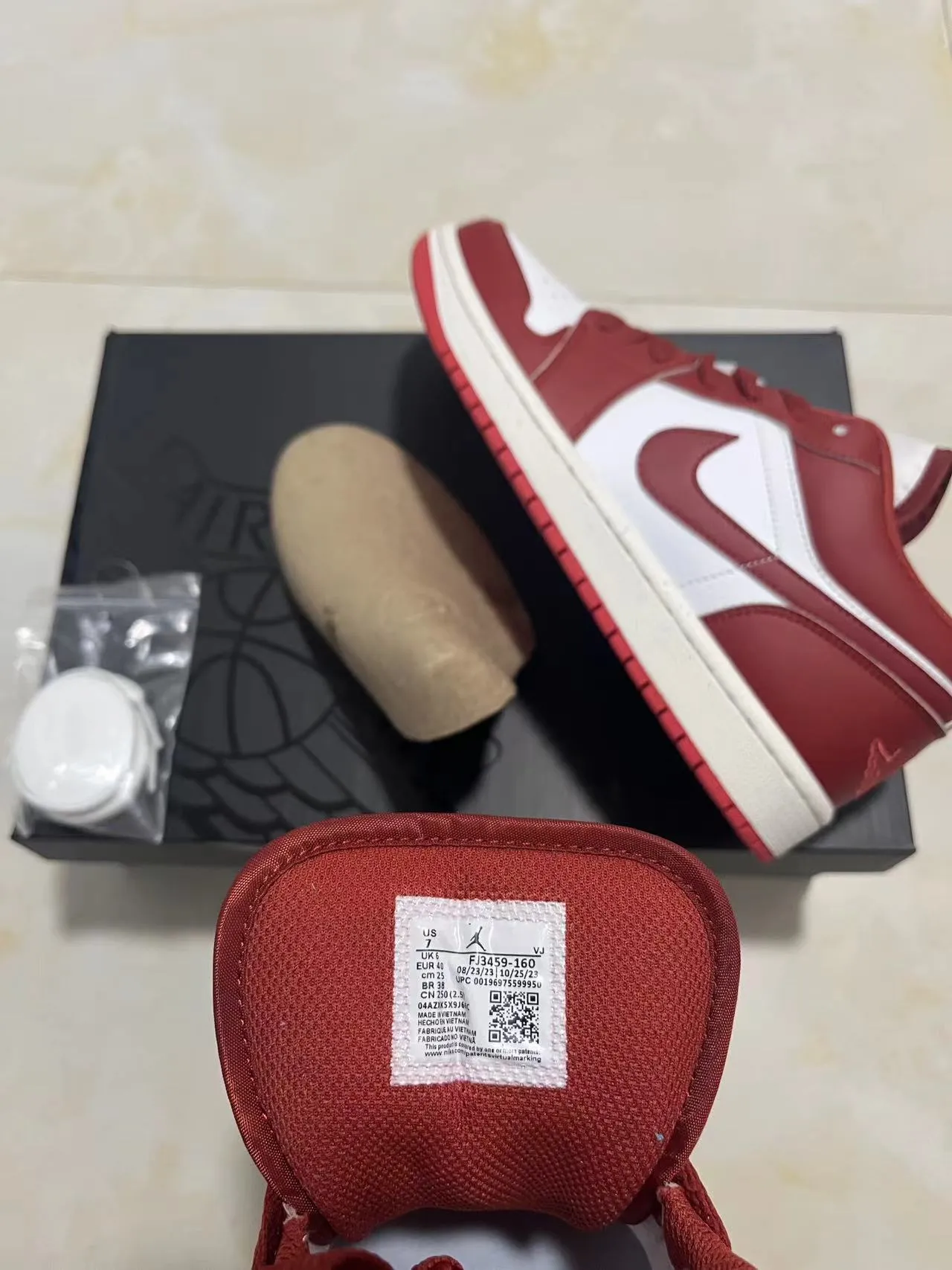 Air Jordan 1 Low Red and White Leather Lifestyle Sneakers 9