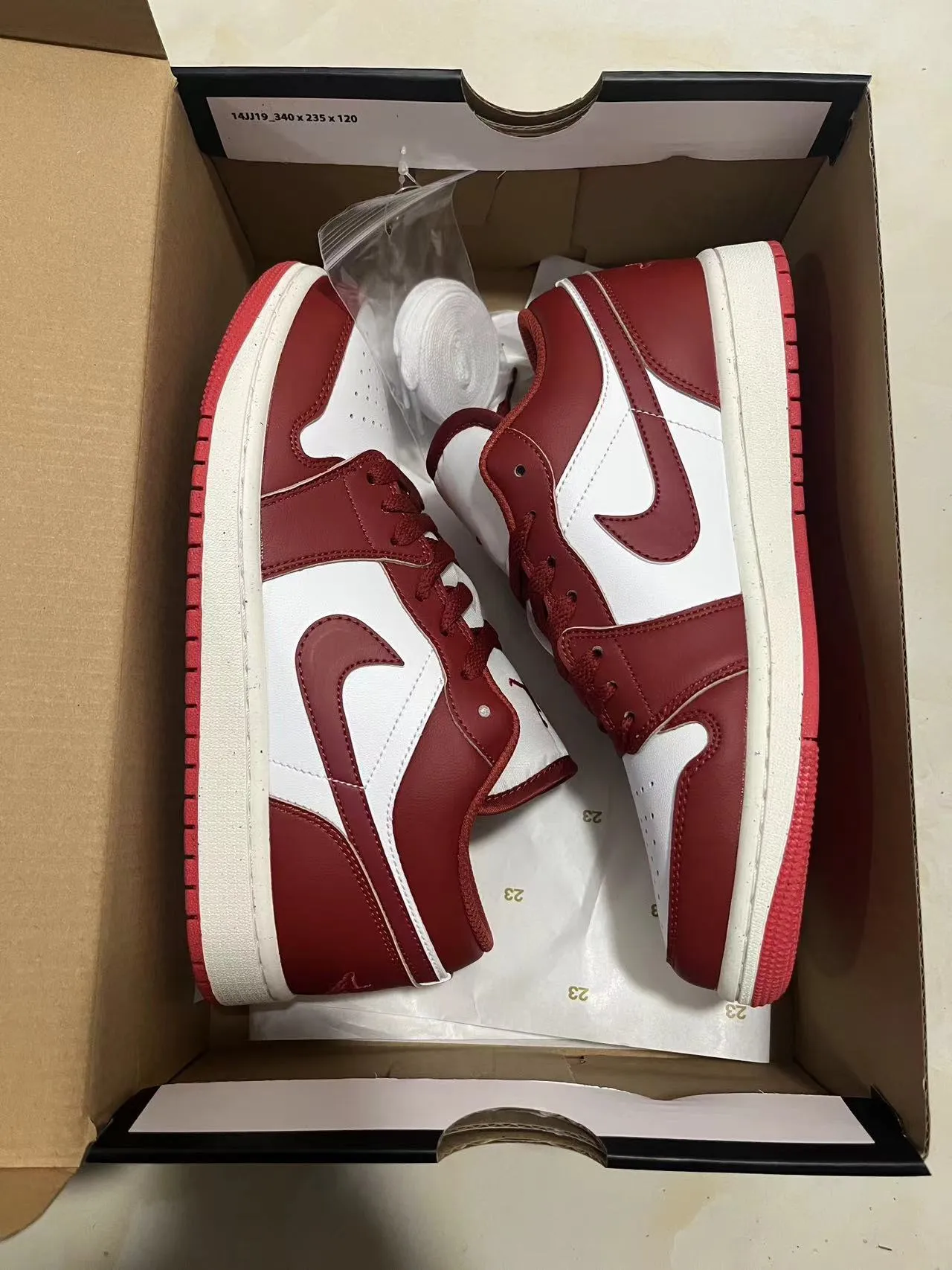 Air Jordan 1 Low Red and White Leather Lifestyle Sneakers 11