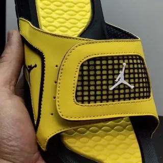 Air Jordan Yellow Black Molded Wave-Patterned Footbed Jumpman Logo Accent Slippers