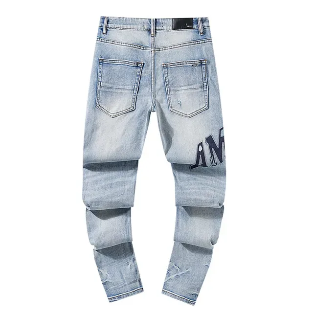 Amiri Blue Black Distressed Embroidered Logo Jeans 3