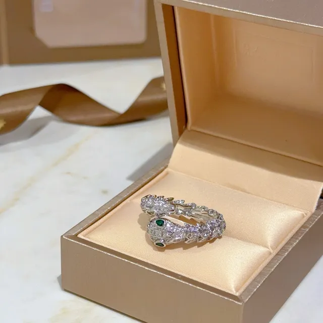 Bvlgari Serpenti Pavé Diamond and Emerald Coiled Snake Ring 6