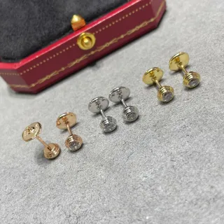 Cartier Aretes de Oro y Plata con Bezels Acanalados y Piedra Redonda Simple