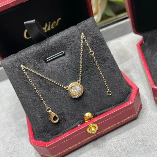 Cartier Gold Swirl Solitaire Pendant Necklace