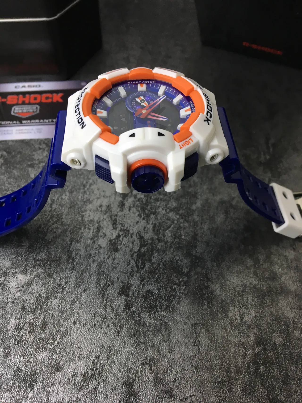 Casio G-Shock GA-100 Montre Sportive Bleue Blanche Orange 6