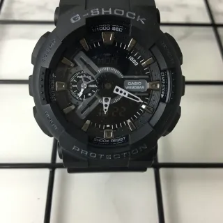 Casio G-Shock GA-100 أسود مطفي تناظري-رقمي ساعة رياضية