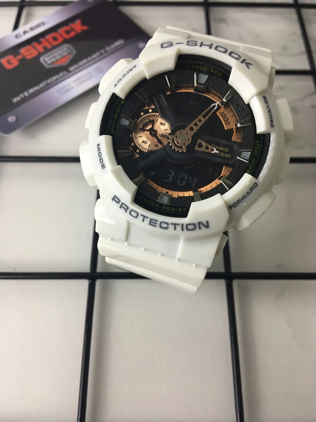 Casio G-Shock GA-100 blanco y negro reloj deportivo 2