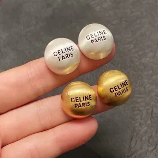 Celine Paris Boucles d'oreilles sphériques gravées