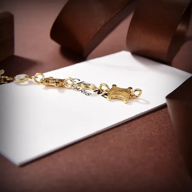 Celine Triomphe Gold-Tone Faceted Stone Link Bracelet 4
