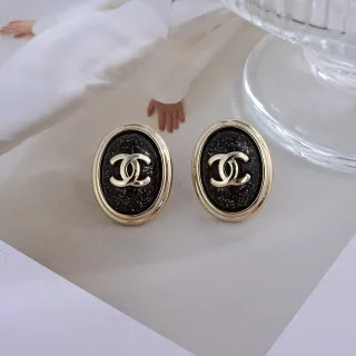 Chanel CC Stud Black Gold Oval Metal Earrings