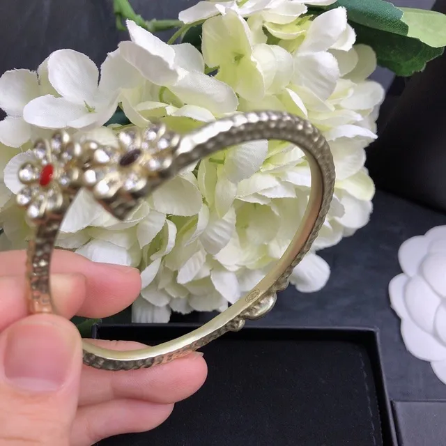 Chanel Floral Motif Gold-Tone Open Bangle Bracelet 3
