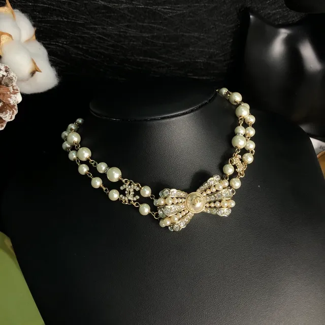 Chanel Pearl and Gold Chain Bow Necklace 8