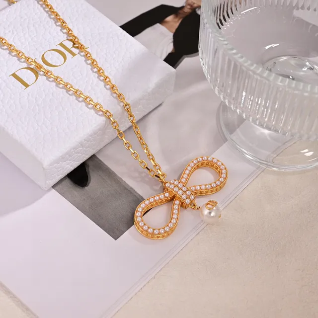 Dior Bow Pearl Gold-Tone Dangling Earrings 2