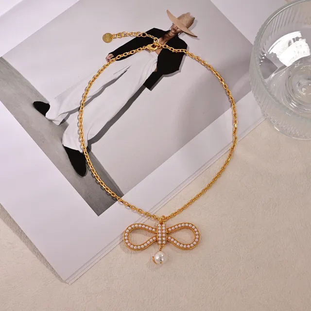 Dior Bow Pearl Gold-Tone Dangling Earrings 5