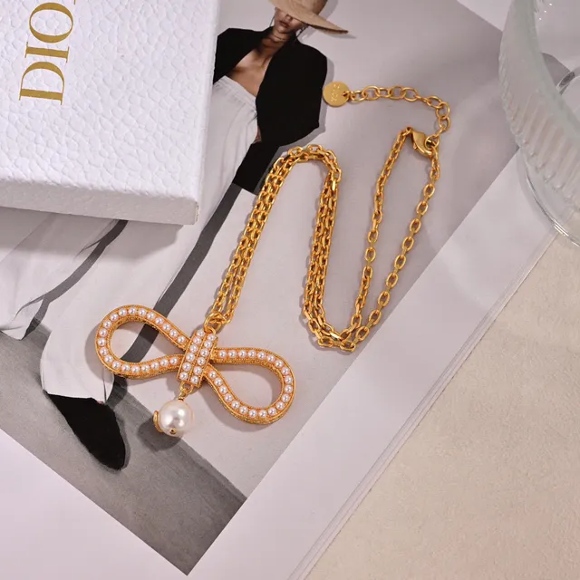 Dior Bow Pearl Gold-Tone Dangling Earrings 9