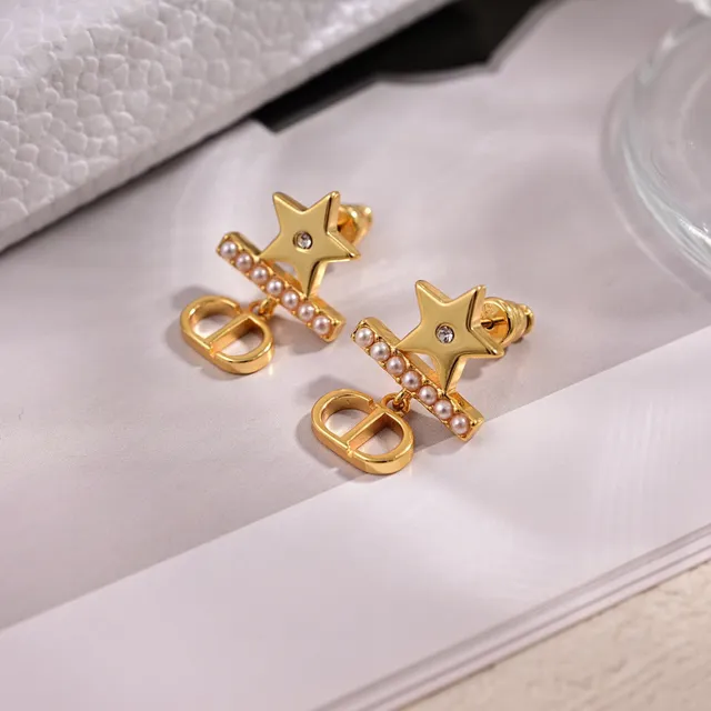 Dior Gold White Star Motif Earrings 2