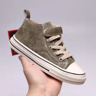 Zapatillas deportivas de cuero de ante de punta alta en verde militar y beige