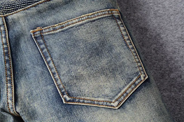 Jeans bleus distressed moto-panelled avec poche zip 4