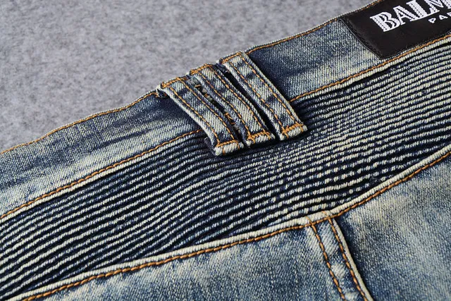 Jeans bleus distressed moto-panelled avec poche zip 5