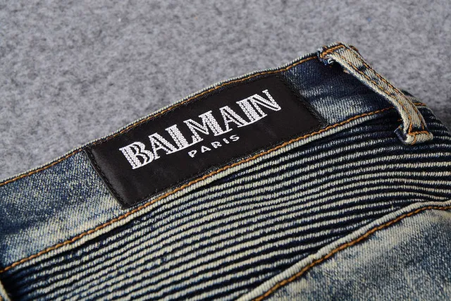 Jeans bleus distressed moto-panelled avec poche zip 6