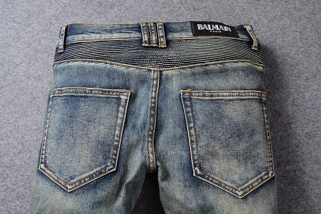 Jeans bleus distressed moto-panelled avec poche zip 7