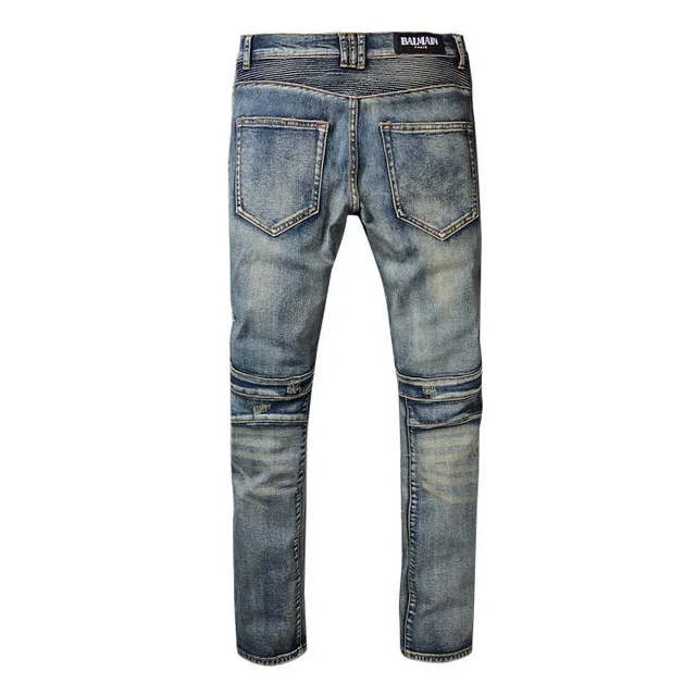 Jeans bleus distressed moto-panelled avec poche zip 8