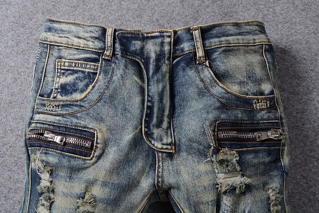 Jeans bleus distressed moto-panelled avec poche zip 12