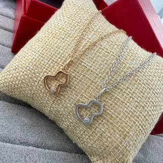 Collares con dije de corazón en tono dorado y plateado con diseño abierto