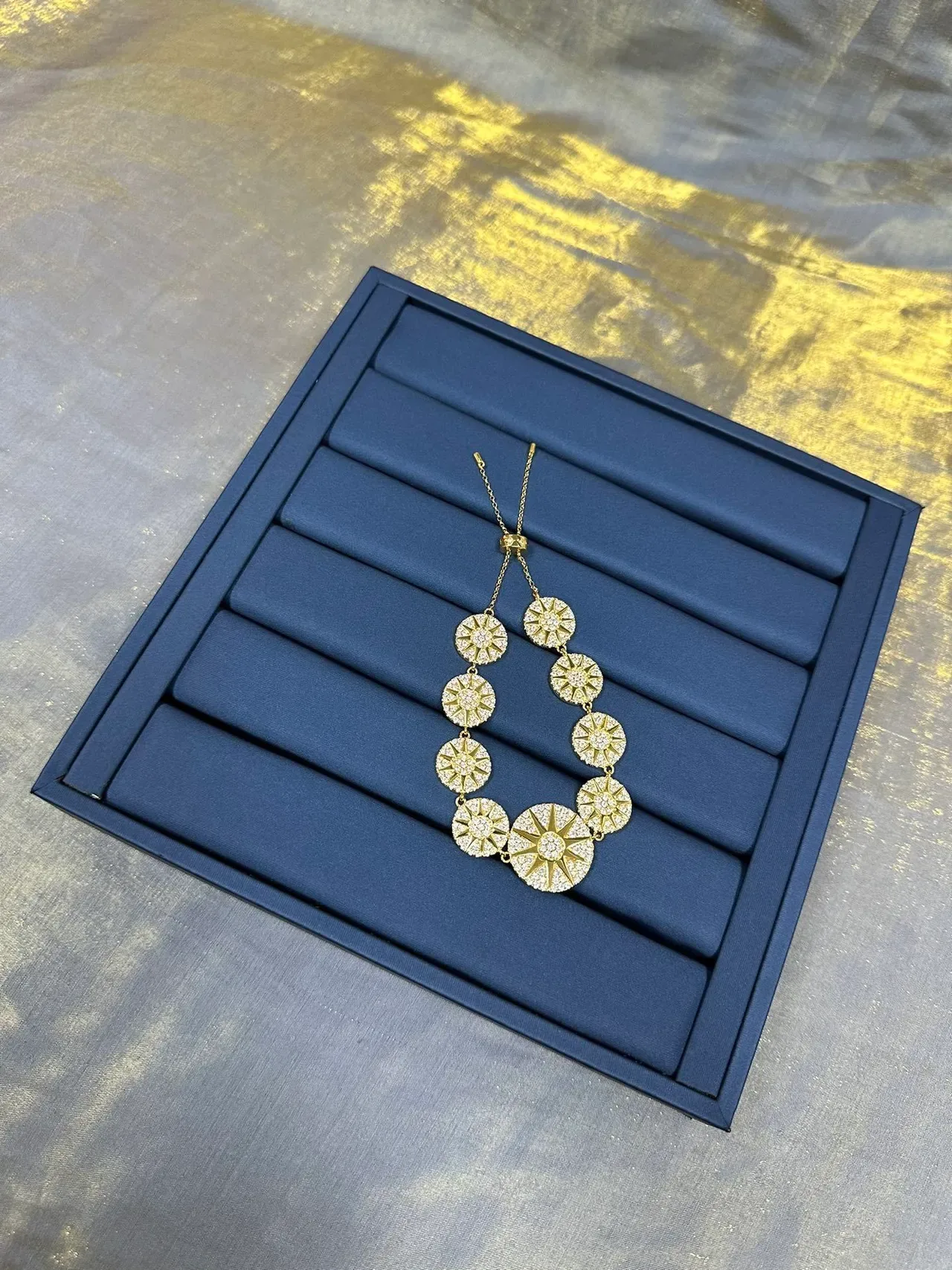 Gold-Tone Crystal Sunburst Three-Circle Bracelet 8