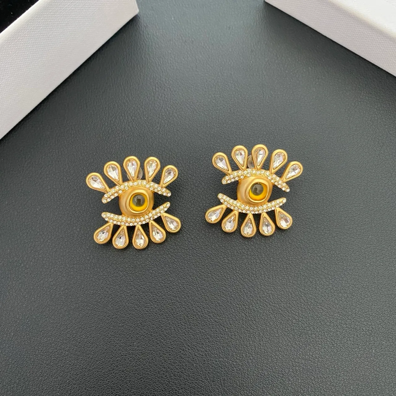 Gold-Tone Eye Motif Crystal Radiating Earrings 8