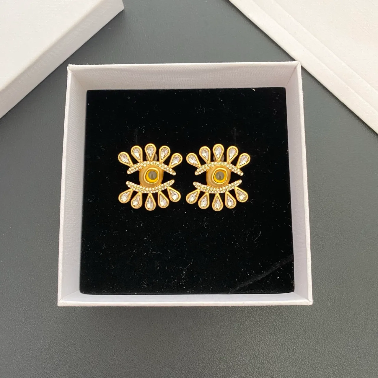 Gold-Tone Eye Motif Crystal Radiating Earrings 9